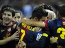 Barca sink 10-man Sevilla