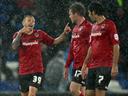 Cardiff soar to top