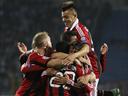 Milan claim win at Zenit 