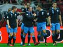 Rooney goal helps poor England hold Poland