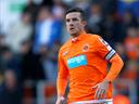 Ferguson delighted at new deal
