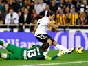 Valencia inflict first defeat on Atletico