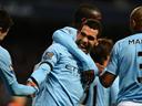 Aguero, Tevez sink doubles in City romp