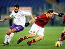 Totti stars as Roma end Fiorentina's unbeaten run