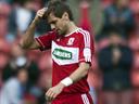 Boro to wait on concussed Woodgate