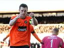 Round-up: United bag point in eight-goal thriller