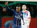 PSG defeat Lyon to go top