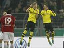 Goetze hat-trick helps Dortmund crush Hannover