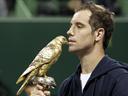 Gasquet downs Davydenko for Doha title 