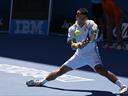 Djokovic breezes through as Monaco exits in first round 