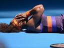 Serena twists ankle, but still romps through