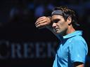 Federer swats aside Frenchman to advance 