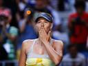 Sharapova marches on, Stosur out