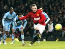 Manchester United through despite Rooney howler
