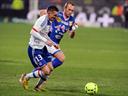 Clumsy Lyon held by Evian 