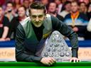 Selby repels Robertson to lift third Masters crown 
