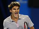 Federer coasts to win over Raonic