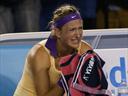 Emotional Azarenka emerges a champion again