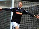 Rendall leads Luton heroics