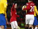 Rooney hits brace as United go seven points clear