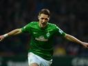 Petersen's late double stops rot for Werder