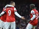 Arsenal overcome Stoke despite bad-tempered finish