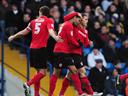 Cardiff strengthen position at top