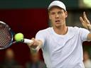Berdych forced to fight, Ferrer wins in Buenos Aires