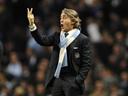 Mancini fancies Wigan to survive