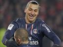 PSG survive late scare to go six clear