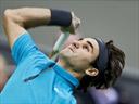 Federer reaches World Indoors quarters