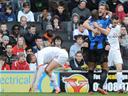 Barnsley survive MK Dons fightback to reach last eight