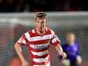 Doncaster hit top spot after win