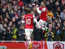 Cazorla double gives Arsenal win to ease strain on Wenger 