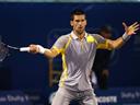 Djokovic and Federer make semis in Dubai