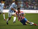 Malaga hold Atletico to goalless draw