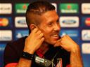 Simeone extends Atletico deal