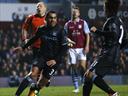 Tevez fires unconvincing City to win at Villa
