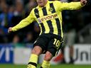 Dortmund ease through