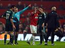 Ref controversy as Madrid dump out 10-man United 