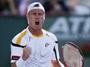 Hewitt blunts the power of Isner in upset win