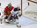 Oilers edge Blackhawks in thriller