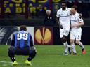 Adebayor sends Spurs through despite Inter comeback