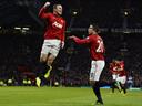 Rooney sends United 15 points clear