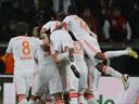 Late own goal puts Bayern on brink of title