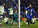 Late Kone strike snatches contentious Wigan win