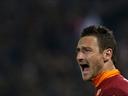Resurgent Roma star Totti leaves door open for Italy recall 