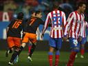 Atletico settle for draw against Valencia