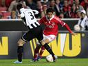 Benfica hit three to sink Newcastle