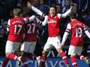 Arsenal hold off WBA despite Mertesacker red